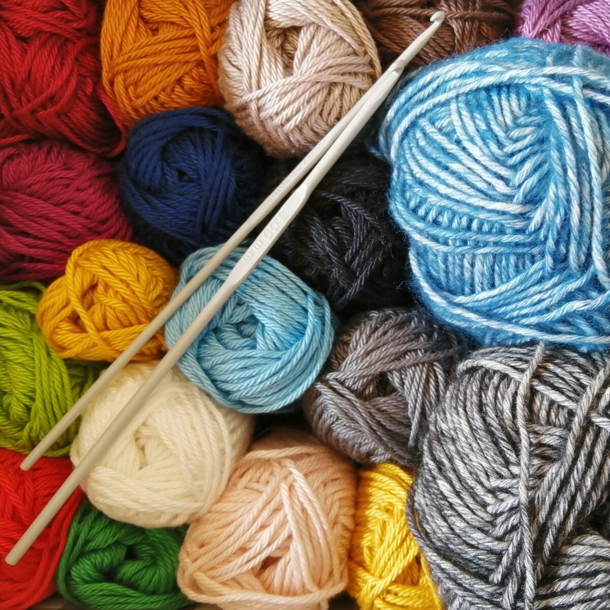 orange blue and white yarn